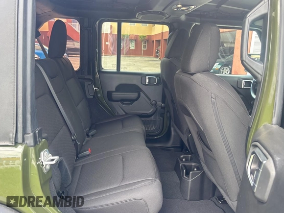 2023 Jeep Wrangler Willys with VIN 1C4HJXDN1PW530435, listed as a Copart auction lot 64590515 with 4,363 mi miles and Clean title. Bid and sale history available at DreamBid. Image 6.