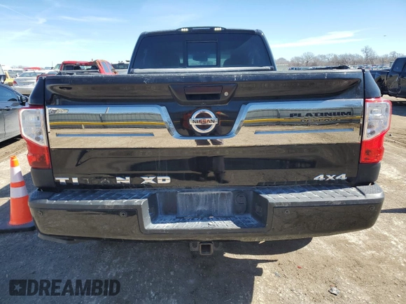 2017 Nissan Titan Pro-4X z VIN 1N6BA1F43HN557633, wystawiony jako Copart lot #46501645 z przebiegiem 94 325 mil mil oraz Szkoda całkowita • Salvage title. Historia ofert i sprzedaży dostępna na DreamBid. Obrazek 6.