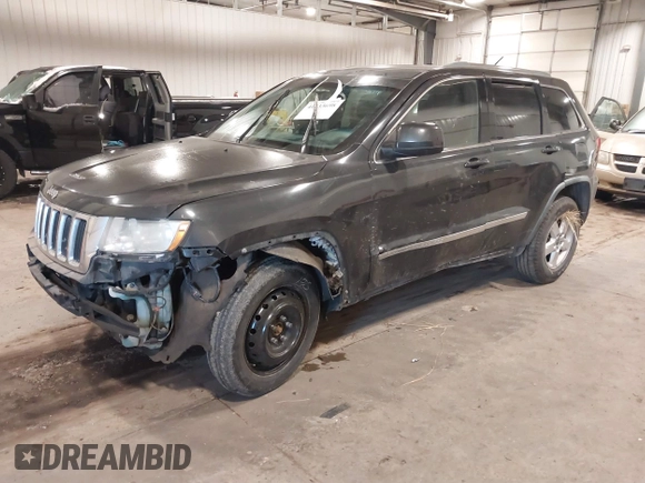2011 Jeep Grand Cherokee 70th Anniversary with VIN 1J4RR4GG3BC745652, listed as a IAAI auction lot 41133698 with 217,948 mi miles. Bid and sale history available at carsss.com. Image 17.
