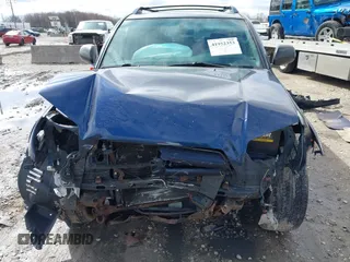 2004 Toyota 4Runner SR5 with VIN JTEBU14R648016279, listed as a IAAI auction lot 41952353 with 165,699 mi miles and . Bid and sale history available at DreamBid. Image 13.