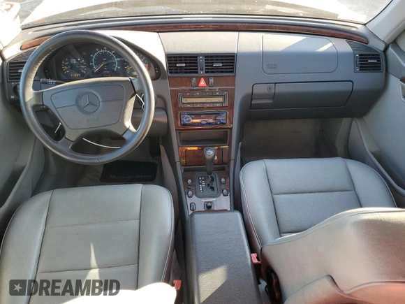 1997 Mercedes-Benz C with VIN WDBHA23E7VF545229, listed as a Copart auction lot 43518335 with 153,158 mi miles and Salvage title. Bid and sale history available at DreamBid. Image 8.