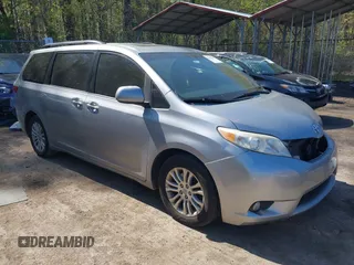 2015 Toyota Sienna XLE with VIN 5TDYK3DC0FS558486, listed as a IAAI auction lot 42064281 with 211,119 mi miles and . Bid and sale history available at DreamBid. Image 1.