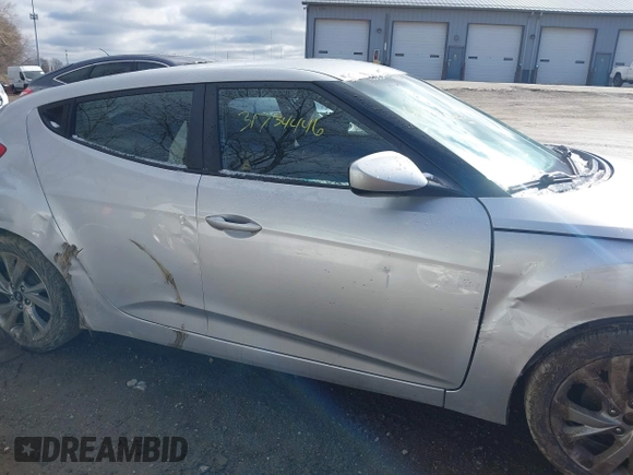 2017 Hyundai Veloster with VIN KMHTC6AD6HU310694, listed as a IAAI auction lot 41734446 with 99,432 mi miles. Bid and sale history available at carsss.com. Image 13.