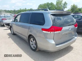 2011 Toyota Sienna LE AAS with VIN 5TDKK3DCXBS156328, listed as a IAAI auction lot 42721542 with 153,286 mi miles and . Bid and sale history available at DreamBid. Image 3.
