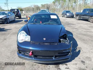 2004 Porsche 911 z VIN WP0AC29954S692825, wystawiony jako IAAI lot #41781530 z przebiegiem 28 942 mil mil oraz . Historia ofert i sprzedaży dostępna na DreamBid. Obrazek 13.