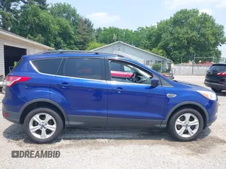 2013 Ford Escape SE z VIN 1FMCU9GX2DUD00321, wystawiony jako IAAI lot #42494558 z przebiegiem 117 600 mil mil oraz . Historia ofert i sprzedaży dostępna na DreamBid. Obrazek 14.