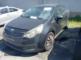 2013 Kia Rio LX with VIN KNADM4A30D6202570, listed as a IAAI auction lot 41215769 with Not Provided miles and . Bid and sale history available at DreamBid. Image 2.