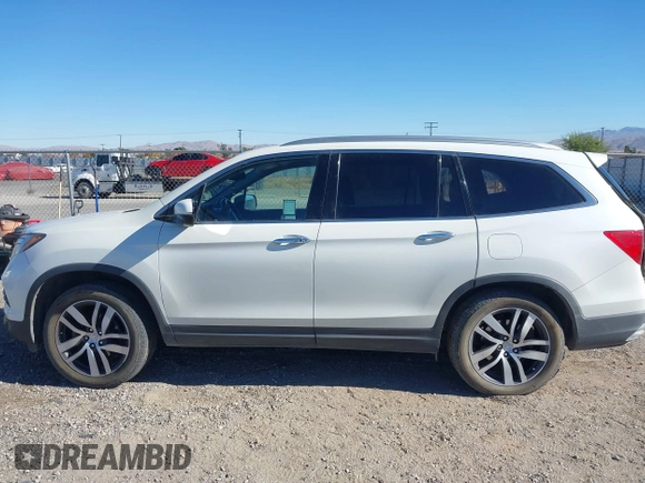 2018 Honda Pilot Touring z VIN 5FNYF6H98JB032821, wystawiony jako IAAI lot #41012077 z przebiegiem 110 321 mil mil oraz . Historia ofert i sprzedaży dostępna na DreamBid. Obrazek 14.