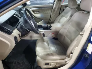 2015 Ford Taurus SEL with VIN 1FAHP2E94FG149695, listed as a Copart auction lot 65609184 with 126,803 mi miles and Salvage Title. Bid and sale history available at DreamBid. Image 7.