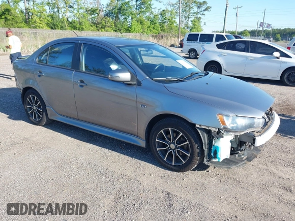 2015 Mitsubishi Lancer SE with VIN JA32V2FWXFU023626, listed as a IAAI auction lot 42012381 with 143,981 mi miles. Bid and sale history available at carsss.com. Image 1.