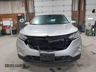 2021 Chevrolet Equinox LT z VIN 3GNAXUEV9MS140887, wystawiony jako IAAI lot #42246019 z przebiegiem 65 108 mil mil oraz . Historia ofert i sprzedaży dostępna na DreamBid. Obrazek 12.