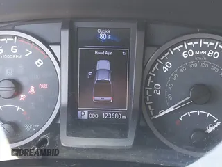 2016 Toyota Tacoma SR5 z VIN 3TMAZ5CNXGM019256, wystawiony jako IAAI lot #42294477 z przebiegiem 123 680 mil mil oraz . Historia ofert i sprzedaży dostępna na DreamBid. Obrazek 7.