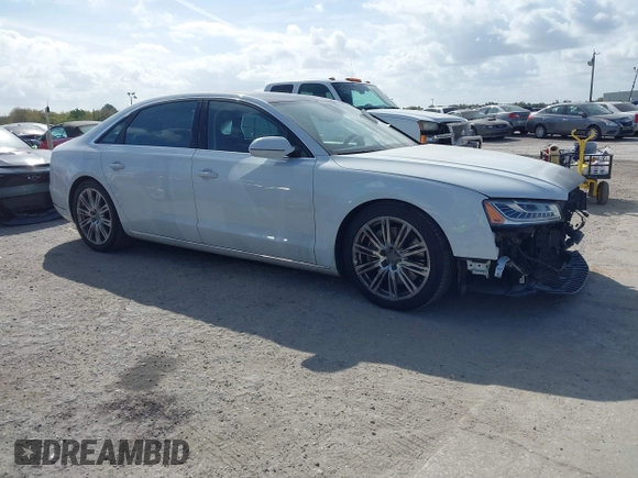 2015 Audi A8 L 4.0T with VIN WAU32AFD4FN002639, listed as a IAAI auction lot 41703951 with 103,722 mi miles. Bid and sale history available at carsss.com. Image 1.