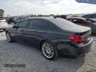 2014 BMW 7 Series 740Li with VIN WBAYE4C52ED138770, listed as a Copart auction lot 53647665 with 106,827 mi miles and Salvage title. Bid and sale history available at DreamBid. Image 2.