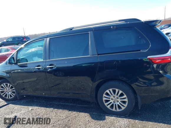 2016 Toyota Sienna XLE with VIN 5TDYK3DC3GS697173, listed as a IAAI auction lot 40899585 with 121,693 mi miles. Bid and sale history available at carsss.com. Image 13.