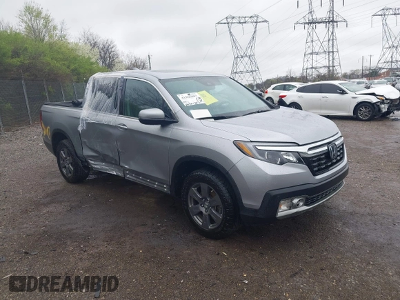 2020 Honda Ridgeline RTL-E with VIN 5FPYK3F73LB004365, listed as a IAAI auction lot 41965887 with 80,981 mi miles and . Bid and sale history available at DreamBid. Image 1.