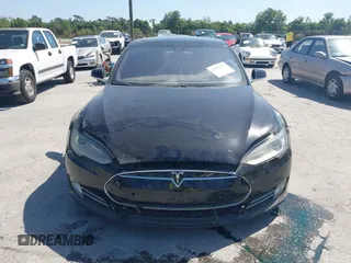 2014 Tesla Model S P85D with VIN 5YJSA1H25EFP65571, listed as a IAAI auction lot 42185442 with 115,990 mi miles and . Bid and sale history available at DreamBid. Image 11.