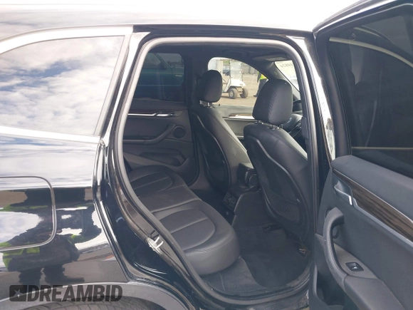 2017 BMW X1 sDrive28i with VIN WBXHU7C3XHP924635, listed as a IAAI auction lot 41744824 with 74,143 mi miles. Bid and sale history available at carsss.com. Image 8.