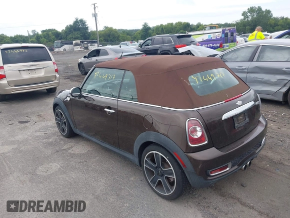 2011 MINI Convertible S with VIN WMWZP3C50BTX84044, listed as a IAAI auction lot 42669717 with Not provided miles and . Bid and sale history available at DreamBid. Image 3.