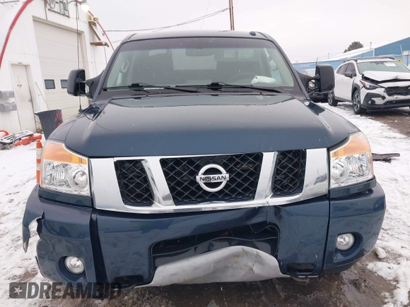 2015 Nissan Titan SV z VIN 1N6AA0ECXFN507260, wystawiony jako IAAI lot #41203612 z przebiegiem 103 000 mil mil oraz . Historia ofert i sprzedaży dostępna na DreamBid. Obrazek 12.