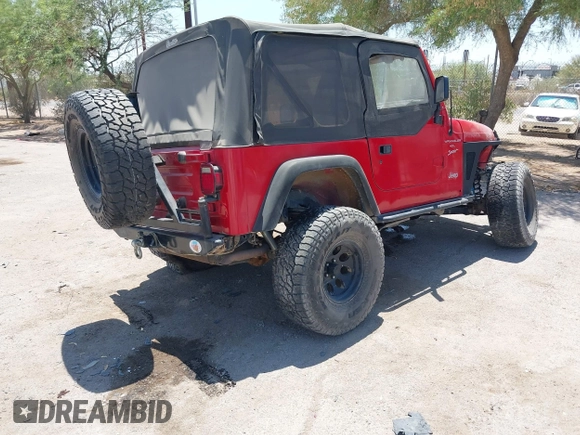 2000 Jeep Wrangler Sport with VIN 1J4FA49S0YP731544, listed as a IAAI auction lot 42570831 with Not provided miles and . Bid and sale history available at DreamBid. Image 4.