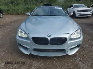 2014 BMW M6 z VIN WBSLX9C53ED160340, wystawiony jako Copart lot #68315924 z przebiegiem 95 899 mil mil oraz Czysty tytuł • Clean title. Historia ofert i sprzedaży dostępna na DreamBid. Obrazek 5.