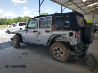 2017 Jeep Wrangler Unlimited Rubicon with VIN 1C4BJWFG4HL677477, listed as a Copart auction lot 57758175 with 89,584 mi miles and Salvage title. Bid and sale history available at DreamBid. Image 2.