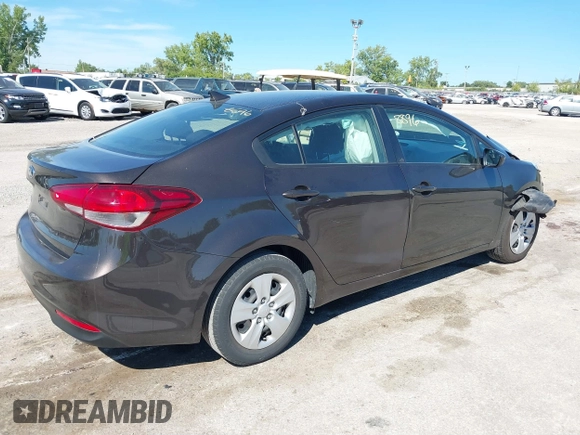 2018 Kia Forte LX with VIN 3KPFK4A70JE217385, listed as a IAAI auction lot 39955381 with 99,060 mi miles. Bid and sale history available at carsss.com. Image 4.