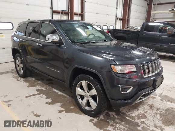 2014 Jeep Grand Cherokee Overland with VIN 1C4RJFCT9EC234270, listed as a IAAI auction lot 41938621 with 144,541 mi miles and . Bid and sale history available at DreamBid. Image 1.