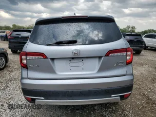2022 Honda Pilot Touring 7-Passenger with VIN 5FNYF6H69NB019572, listed as a Copart auction lot 55446895 with 82,424 mi miles and Salvage title. Bid and sale history available at DreamBid. Image 6.