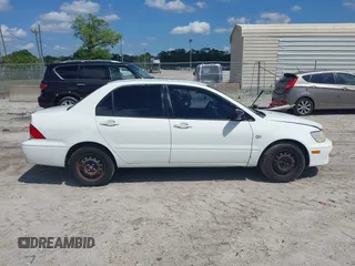 2002 Mitsubishi Lancer ES with VIN JA3AJ26E42U054430, listed as a IAAI auction lot 41918246 with 192,996 mi miles. Bid and sale history available at carsss.com. Image 13.