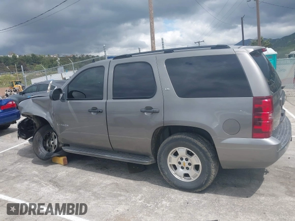 2007 Chevrolet Tahoe LT z VIN 1GNFC13J07J122414, wystawiony jako IAAI lot #39134539 z przebiegiem Nie podano mil oraz . Historia ofert i sprzedaży dostępna na DreamBid. Obrazek 13.