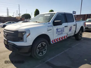 2023 Ford F-150 Lightning Pro с VIN 1FTVW1EL2PWG13712, выставлен на аукционе Copart как лот 56950955 с пробегом 60 605 миль миль и Списание • Salvage title. История ставок и продаж доступна на DreamBid. Изображение 1.