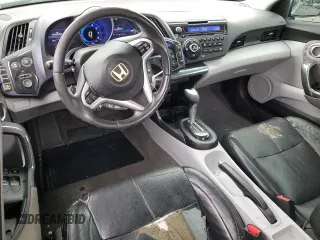 2011 Honda CR-Z EX z VIN JHMZF1D69BS002944, wystawiony jako Copart lot #57101765 z przebiegiem 125 001 mil mil oraz Szkoda całkowita • Salvage title. Historia ofert i sprzedaży dostępna na DreamBid. Obrazek 8.