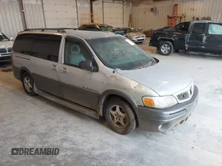 2002 Pontiac Montana w/1SE Pkg z VIN 1GMDX13E12D264233, wystawiony jako IAAI lot #42467786 z przebiegiem 184 997 mil mil oraz . Historia ofert i sprzedaży dostępna na DreamBid. Obrazek 1.