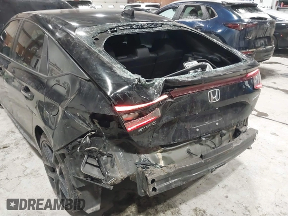 2023 Honda Civic Sport z VIN 19XFL2H85PE007244, wystawiony jako IAAI lot #41572024 z przebiegiem 21 182 mil mil oraz . Historia ofert i sprzedaży dostępna na DreamBid. Obrazek 6.