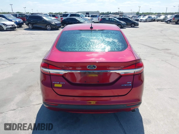 2018 Ford Fusion SE z VIN 3FA6P0LU9JR279976, wystawiony jako IAAI lot #41792558 z przebiegiem 115 790 mil mil oraz . Historia ofert i sprzedaży dostępna na DreamBid. Obrazek 16.
