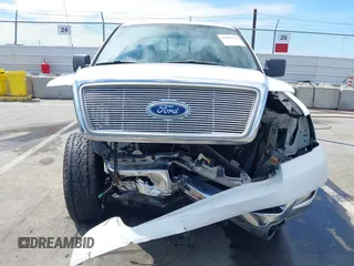 2004 Ford F-150 XLT with VIN 1FTPW14584FA24705, listed as a IAAI auction lot 41883212 with 172,251 mi miles. Bid and sale history available at carsss.com. Image 6.