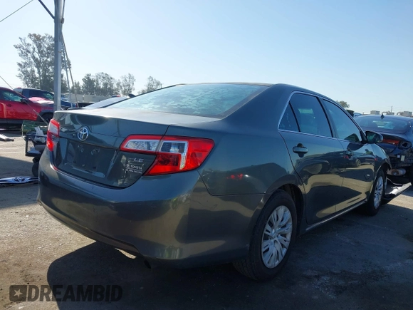 2014 Toyota Camry L with VIN 4T1BF1FK7EU731591, listed as a IAAI auction lot 41917728 with 85,504 mi miles. Bid and sale history available at carsss.com. Image 4.