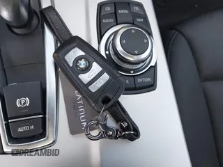 2012 BMW X3 28i z VIN 5UXWX5C59CL718609, wystawiony jako IAAI lot #42138679 z przebiegiem 86 605 mil mil oraz . Historia ofert i sprzedaży dostępna na DreamBid. Obrazek 11.