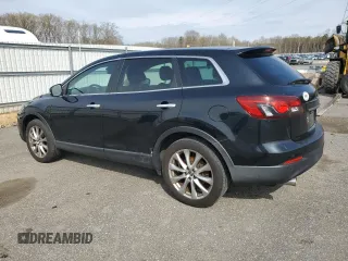 2014 Mazda CX-9 Grand Touring with VIN JM3TB3DV8E0428962, listed as a Copart auction lot 52512545 with 104,819 mi miles and Clean Title. Bid and sale history available at DreamBid. Image 2.