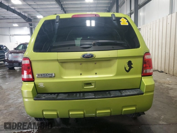 2012 Ford Escape XLT with VIN 1FMCU9D7XCKA07488, listed as a Copart auction lot 58605185 with 144,578 mi miles and Salvage title. Bid and sale history available at DreamBid. Image 6.