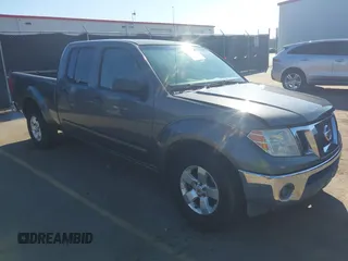 2009 Nissan Frontier LE with VIN 1N6AD09U79C402623, listed as a IAAI auction lot 41656385 with 286,777 mi miles and . Bid and sale history available at DreamBid. Image 1.