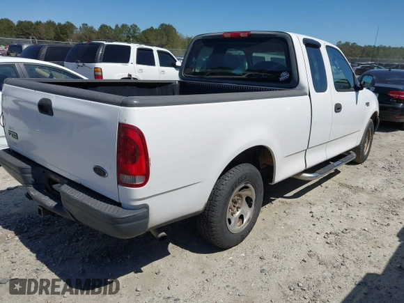 2003 Ford F-150 XL with VIN 1FTRX172X3NA59676, listed as a IAAI auction lot 41821013 with 249,483 mi miles. Bid and sale history available at carsss.com. Image 4.