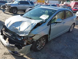 2012 Honda Civic EX-L with VIN 2HGFB2F91CH507657, listed as a IAAI auction lot 41115627 with 253,242 mi miles and . Bid and sale history available at DreamBid. Image 2.