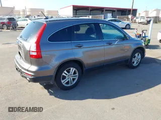 2011 Honda CR-V EX-L with VIN 5J6RE3H79BL015068, listed as a IAAI auction lot 41535627 with 126,526 mi miles. Bid and sale history available at carsss.com. Image 4.