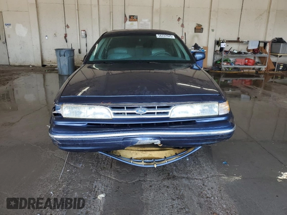 1997 Ford Crown Victoria LX с VIN 2FALP74W2VX109574, выставлен на аукционе Copart как лот 56222925 с пробегом 175 901 миль миль и Списание • Salvage title. История ставок и продаж доступна на DreamBid. Изображение 5.