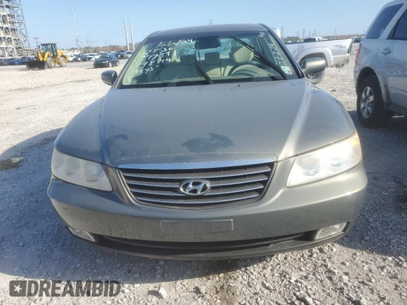 2007 Hyundai Azera SE z VIN KMHFC46FX7A178714, wystawiony jako Copart lot #49264985 z przebiegiem 89 266 mil mil oraz Szkody całkowita. Historia ofert i sprzedaży dostępna na DreamBid. Obrazek 5.