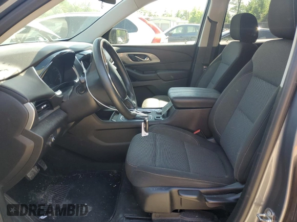 2018 Chevrolet Traverse LS with VIN 1GNERFKW9JJ276499, listed as a Copart auction lot 56007095 with 69,202 mi miles and Salvage title. Bid and sale history available at DreamBid. Image 7.