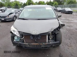 2012 Toyota Sienna LE AAS with VIN 5TDKK3DC9CS176135, listed as a IAAI auction lot 42518638 with 171,716 mi miles and . Bid and sale history available at DreamBid. Image 13.